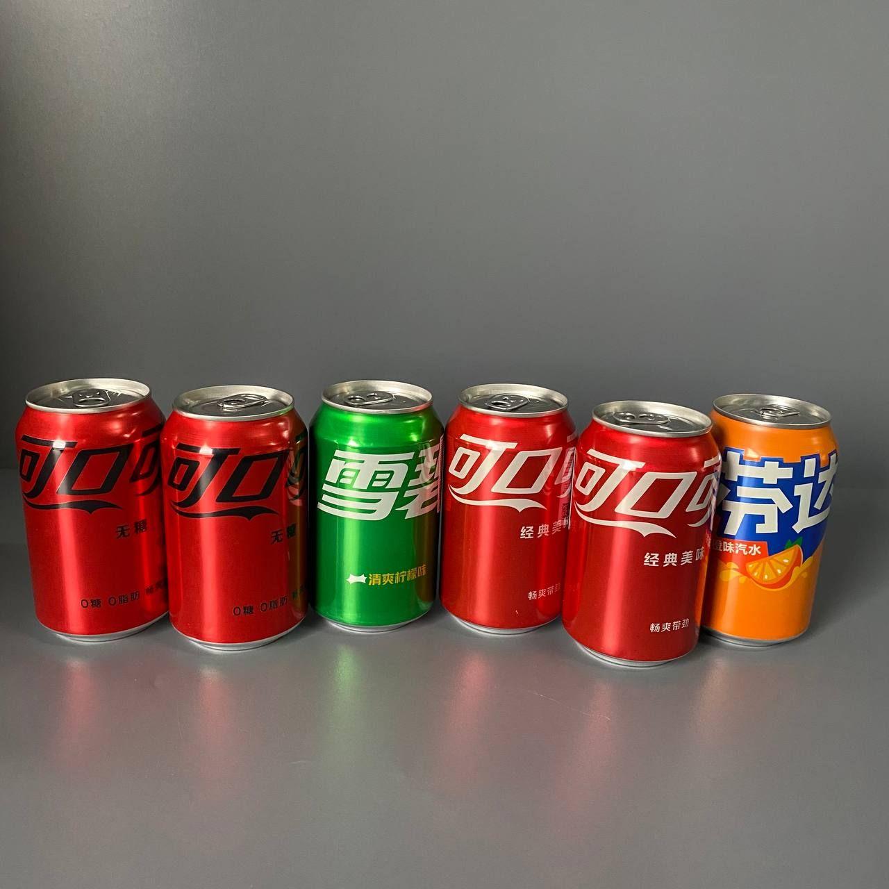 Микс газированных напитков Coca-Cola 2 шт., Coca-Cola Zero 2 шт., Fanta 1 шт., Sprite 1 шт. по 330 мл