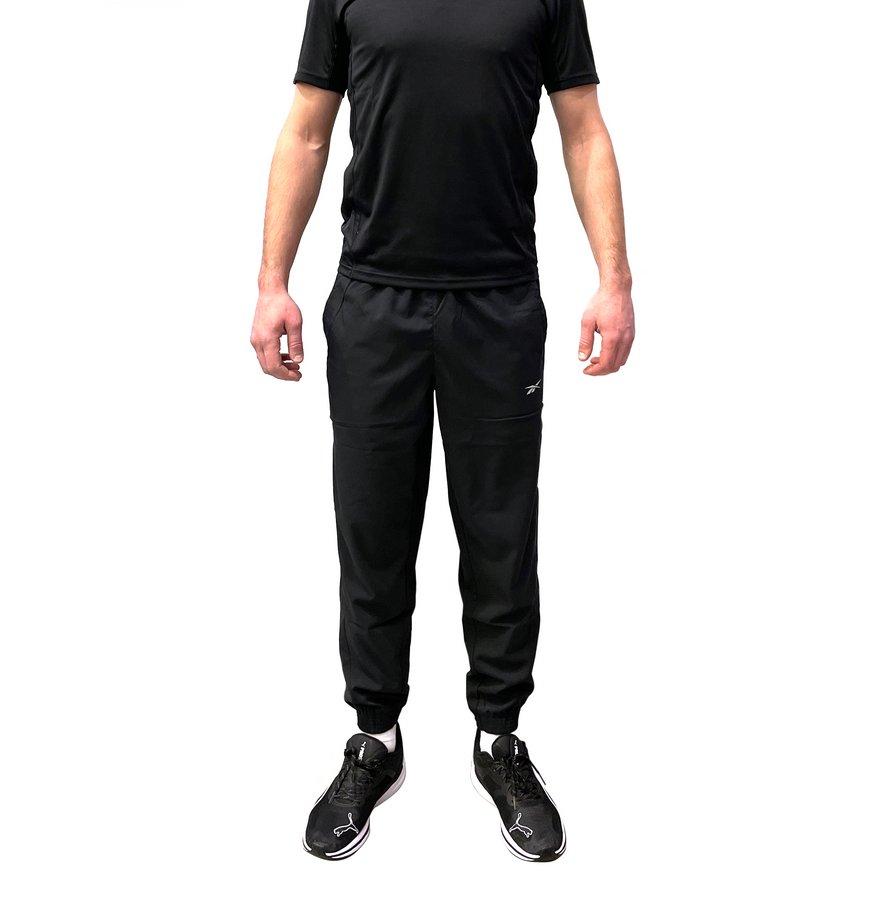 брюки Reebok RUNNING PANT